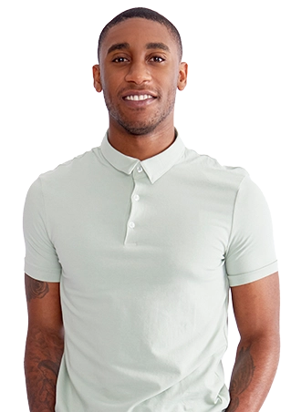 A smiling man in a light colored shirt