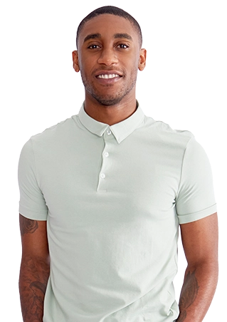 A smiling man wearing a light green t-shirt