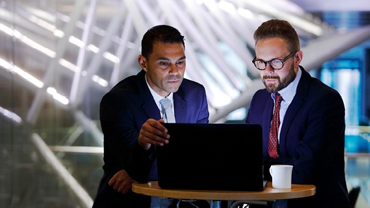 Men at a laptop